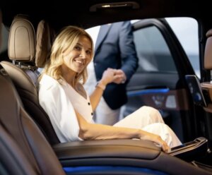 Client enjoying Johns Creek airport limo ride in luxury SUV from Kleo Black Car Service