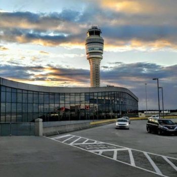 Atlanta airport tower Exterior view of Hartsfield-Jackson Atlanta International Airport terminal with control tower.