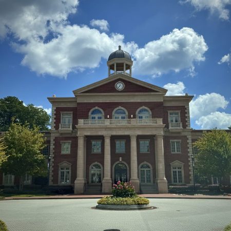 Alpharetta City Hall landmark with clock tower — banner image for Alpharetta limo service.