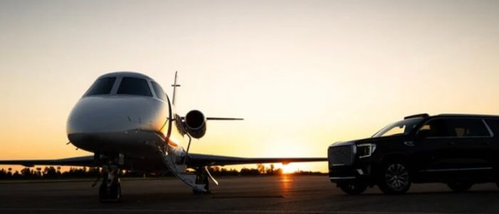 Screenshot Private jet with luxury black SUV for Atlanta airport car service at sunset.